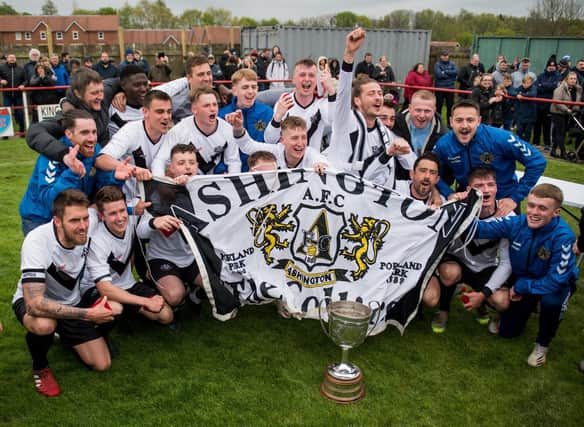 Ashington celebrate their Cup win on Monday. Picture by Ian Brodie.