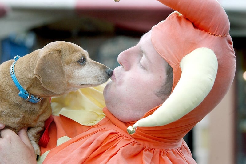 A four-legged friend gets in on the act at the 2004 Alnwick Fair.