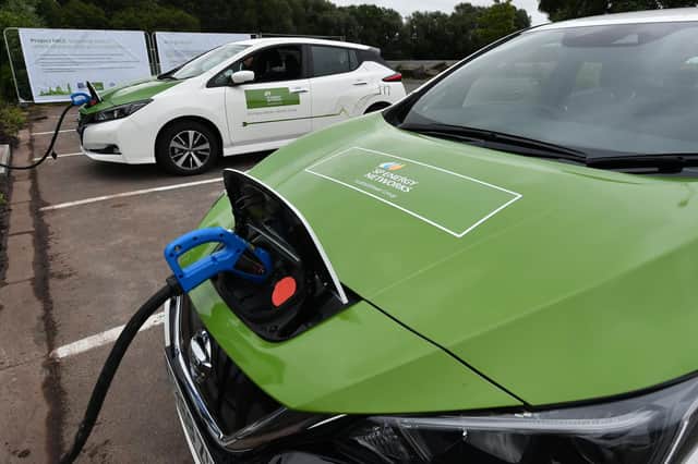 Electric vehicles being charged. Picture by John Devlin.