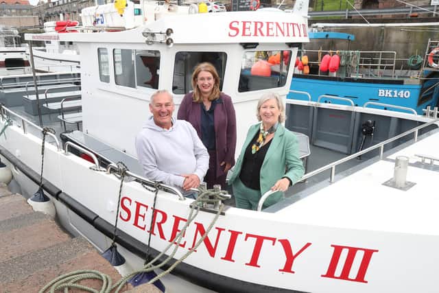 Andrew Douglas, owner Serenity Farne Island Boat Tours in Seahouses, Sarah Green, Chief Executive NGI and Fiona Pollard, Chair of VisitEngland. Picture: Steve Brock
