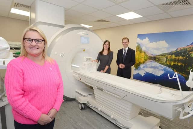 Patient Judith Short who has benefitted from the scanner with Dr Margaret Wilkinson, consultant radiologist, Northumbria Healthcare and  Matthew Stork, managing director, diagnostics services, InHealth at the opening of the new MRI scanner at Wansbeck Hospital.
 Picture by Jane Coltman