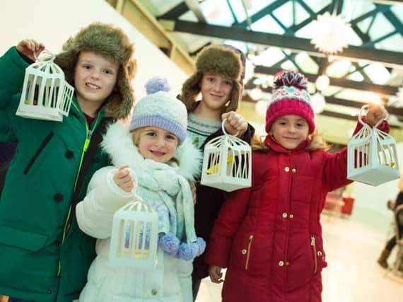Young visitors set out on a Winter Quest with their lanterns. Picture by Richard Kenworthy