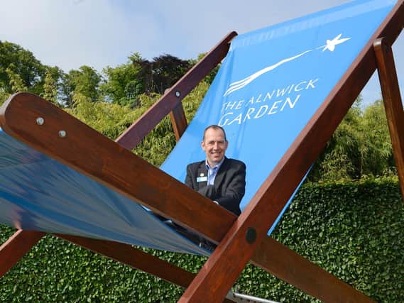 Garden director Mark Brassell in the giant deckchair. Picture by Jane Coltman