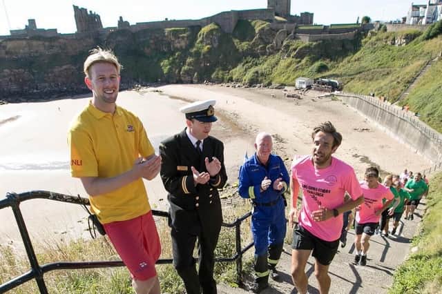 Will Hogg (in pink) leads the King Eddies Stairs Challenge at King Edwards Bay, Tynemouth.