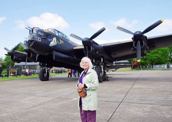 Alexa Nisbet with the Lancaster bomber.