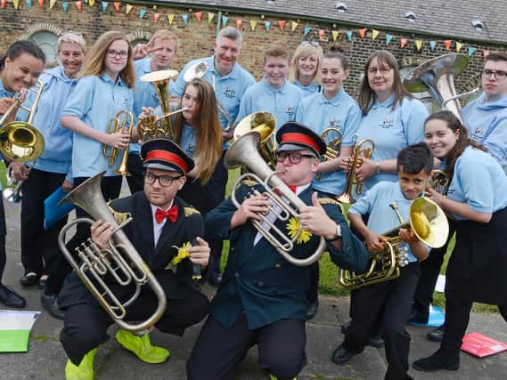 Bedlington Community Brass Band with a couple of guests from the Bread and Butter Theatre Company. Picture by Jane Coltman