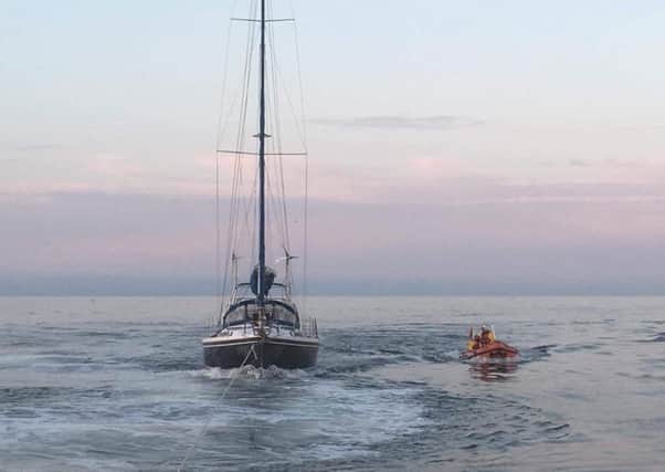 The yacht was was towed to the marina by the Amble RNLI all-weather lifeboat. Picture by crewman Esmond Coulter.