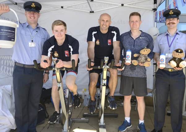 Staff from RAF Boulmer are taking part in a mammoth spin session at Willowburn Sports and Leisure Centre, in Alnwick, to celebrate 100 years of the RAF.  Picture by Jane Coltman