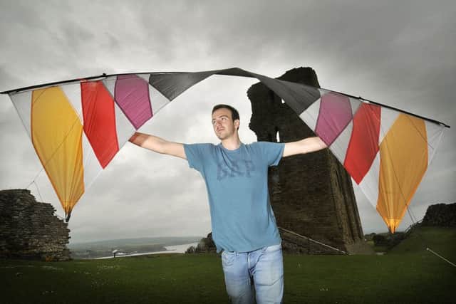 Champion kite flier Josh Mitcheson puts his handmade kite through its paces.