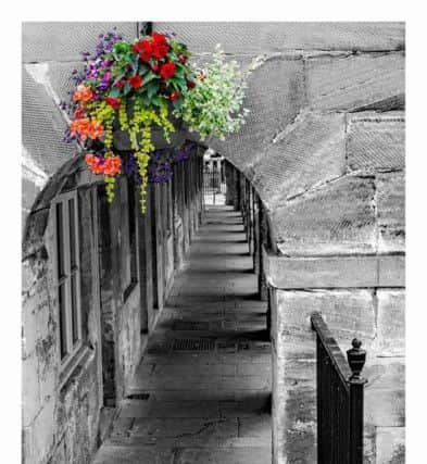 The Shambles in Alnwick is given George Taylor's 'hint of colour' treatment. 200 Facebook likes