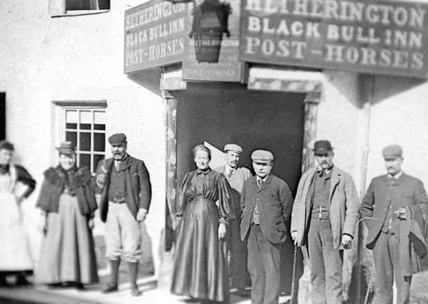 Black Bull proprietors Mr and Mrs Hetherington and their staff, pictured in around 1900.