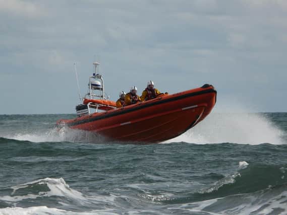 Newbiggin RNLI lifeboat crew in action. Picture by RNLI/Newbiggin.