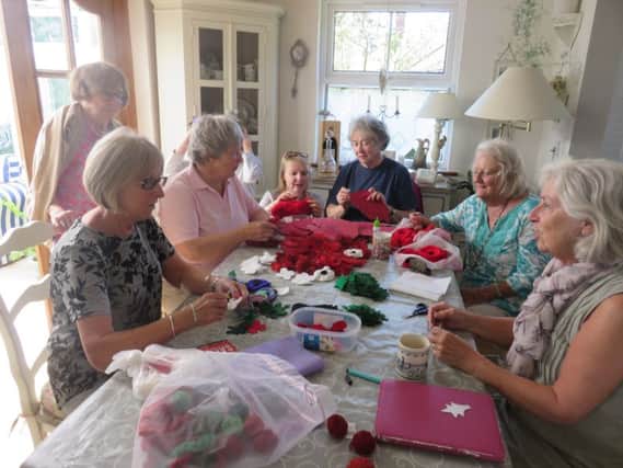 Working hard to make the poppies.