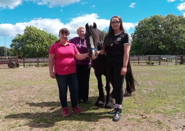 Pictured, from left, are volunteer Kelly Dodds, Jackie Dawe, Storm, a pony, and volunteer Lauren Whitworth.