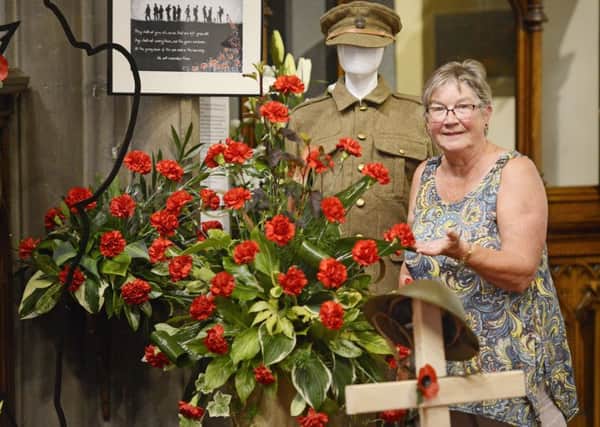 Chris McElhone at the flower festival in St Paul's RC Church in Alnwick. Picture by Jane Coltman