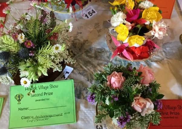 Arrangements in a cup and saucer at Howick Village Show. Picture by Tom Pattinson.