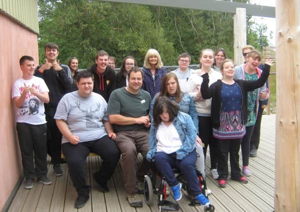 Alex Lister, Druridge Bay Living Landscapes Manager (front row,
centre) with the Hauxley artists. Photo by Jenna Berry