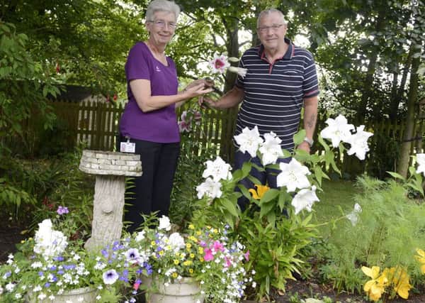 The best residential retirement complex is St Paul's Court where Joan Brown and Bob Beattie are seen in the garden.