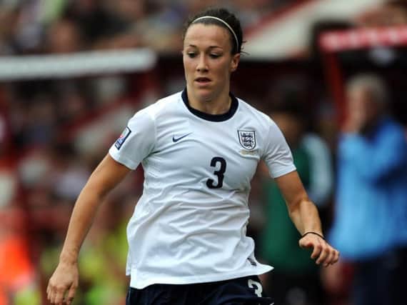 Lucy Bronze playing for England.