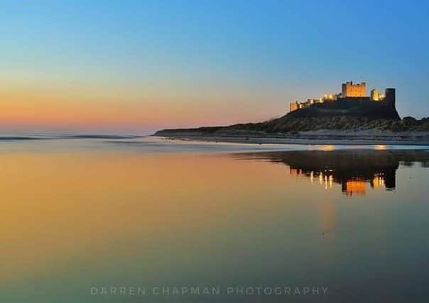 1ST: Reflection of Bamburgh Castle in this lovely Darren Chapman picture (330 likes)