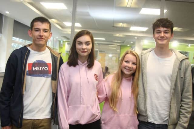 Four successful KEVI A-level students. From left, Thomas Earl, Rachel Hughes, Libby Eaton and Will Capps. Picture by Lewis Jackson.