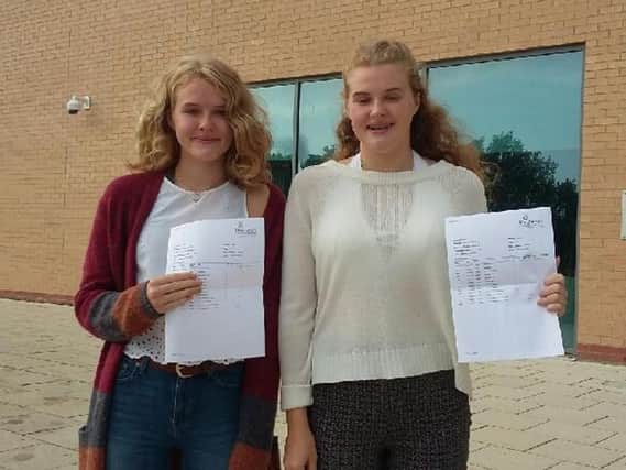 Twins Isobel and Abigail Rowland collected their GCSE exam results today.