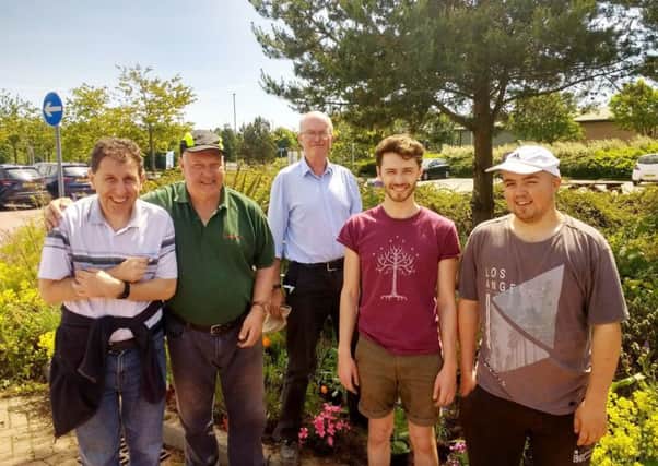 Raymond Easton, Barry Dent, Clive Moon and Jacob Rotheroe-Hemming, from Hepscott Park Horticultural Skills Unit, with care worker Jason Nelson.