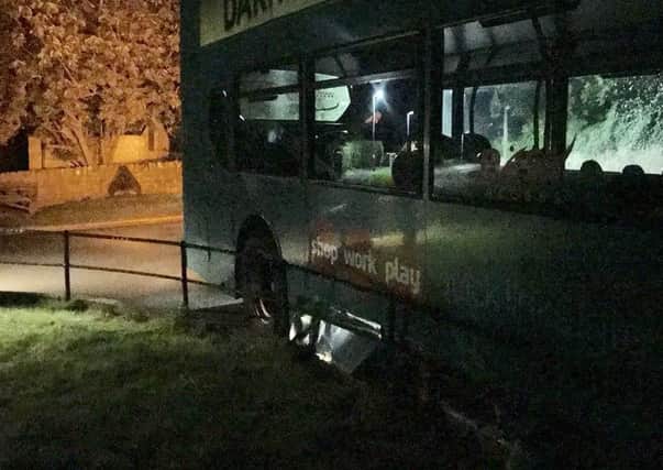 The bus was embedded in the railings. Picture by Andy Harris.