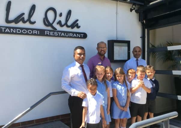 Pupils from Eastlea Primary School, in Cramlington, enjoy a visit to Lal Quila Indian restaurant.