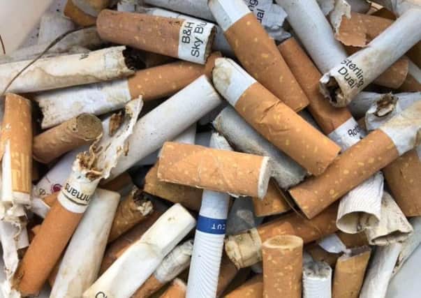Cigarette butts are causing a litter problem.