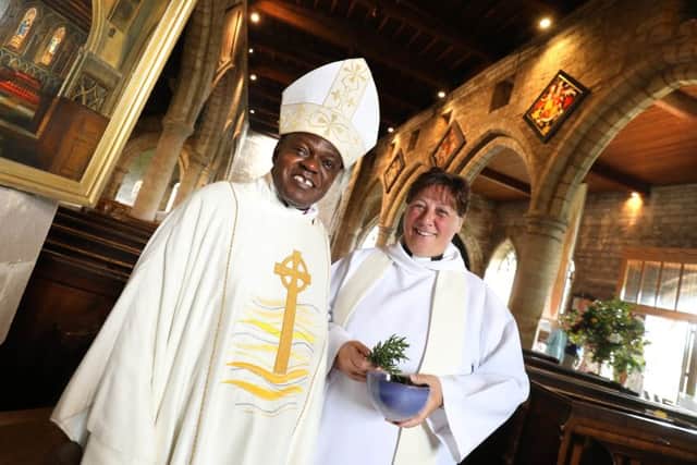 Atchbishop of York, Dr John Sentamu, with Rev Teresa Walton at St Aidan's Church in Bamburgh. Picture by Crest Photography