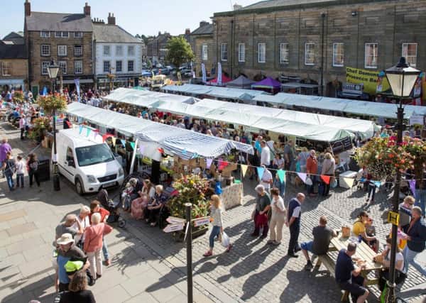 People packed into Alnwick Market Place.