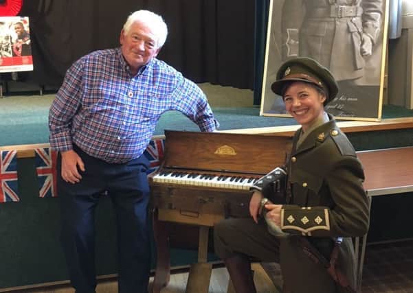 Jeff Watson, chairman of Warkworth and Amble District Branch of the Royal British Legion, with Beverley Palin and her trench organ.