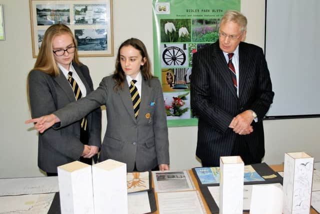 Catherine Skelton and Hanna Marshall, from Blyth Academy, show the designs for the new entrance to Ridley Park.