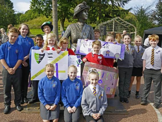 School pupils and Penni Blythe at the statue unveiling ceremony. Picture by Jane Coltman.