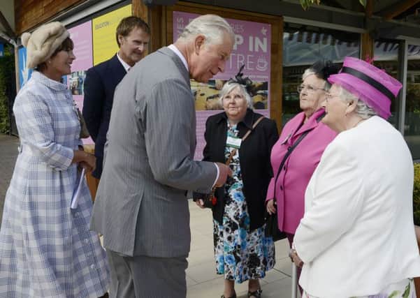 Prince Charles chats to sisters Eileen Gearing, Sheila Maddison and Audrey Maddison.