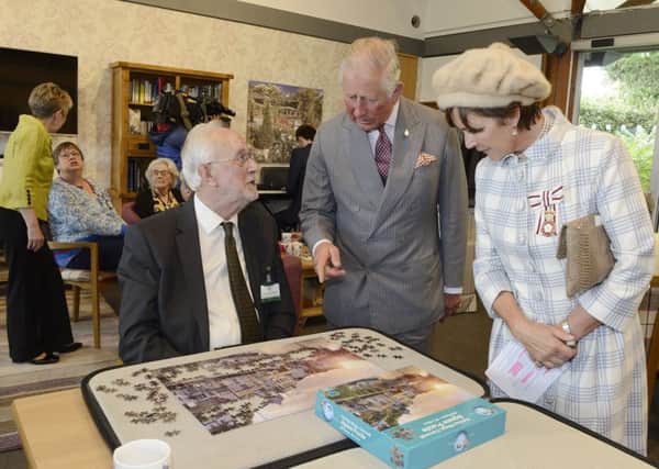 The Prince of Wales and the Duchess of Northumberland chat to Maurice Frost. Picture by Jane Coltman