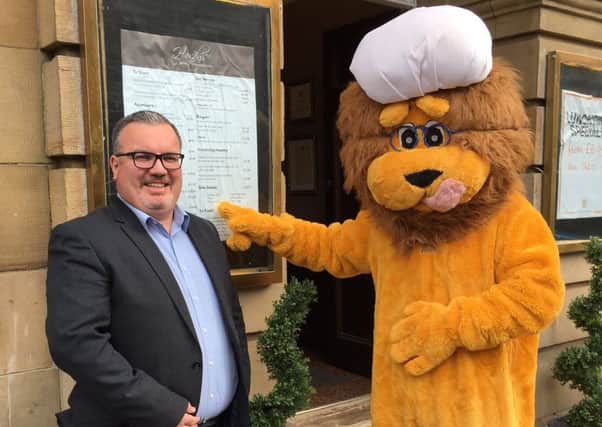 Alnwick Food Festival mascot Alf, an ambassador for the event's new Friends scheme, with Craig Martin, general manager at The White Swan Hotel, a platinum member of the scheme.