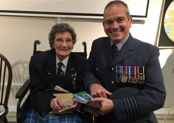 WAAF Edith Hunter with Group Captain Chesh Cowieson, RAF Boulmer Station Commander.
