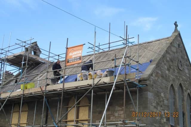Flashback to the work being carried out on the roof at St Peter's in Craster.