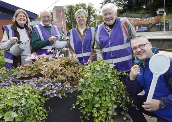 Blooming success for Friends of Alnmouth Station Elizabeth Jones, Atholl Swanston, Katherine Challis and Wendy Dickson with station supervisor Mark Dyer. Picture by Jane Coltman