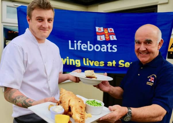 Will Hall, head chef at The Lindisfarne Inn with Ian Clayton, operations manager at Seahouses Lifeboat.