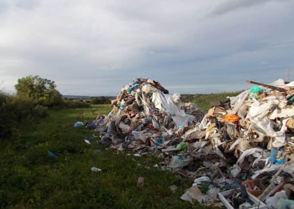 Waste dumped illegally in a rural area. Picture by the Environment Agency.