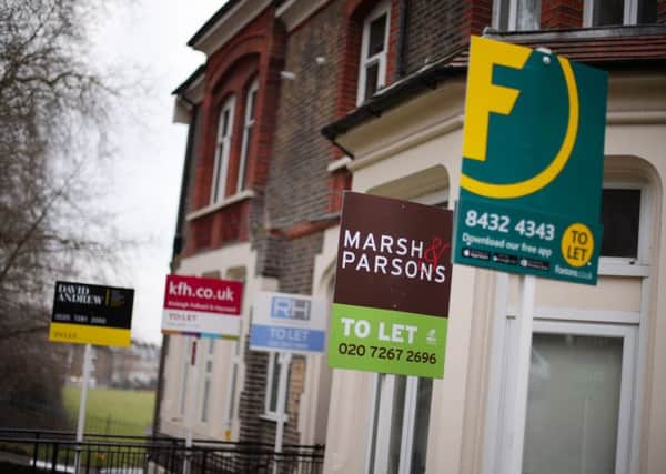 A row of To Let estate agent signs outside houses. Picture by Yui Mok/PA Wire