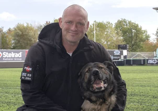 PC Aaron Curry and police dog Kevin.