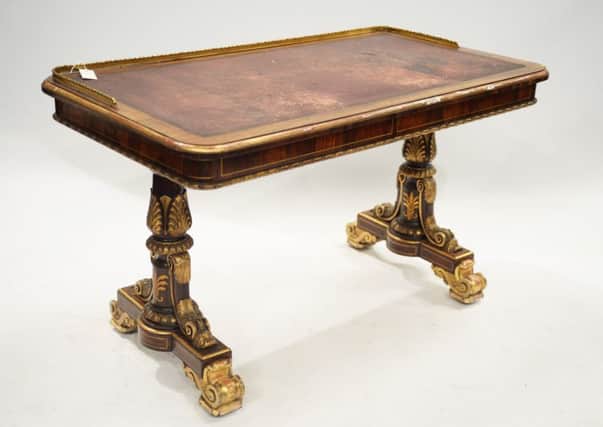 Lot 336 - Regency rosewood and parcel gilt writing table.