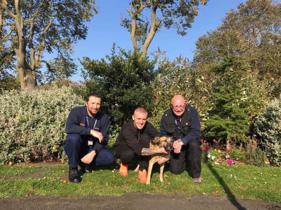 Animal Welfare Officers Malcolm Barrass and Neil Armstrong with dog Arnie and owner Chris Walker from Blyth.