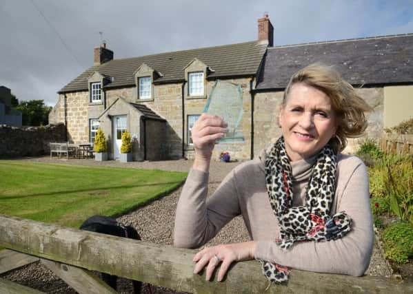 Patricia Reavley celebrates scooping gold in a travel awards programme run by UK holiday rental firm, Sykes Holiday Cottages.
