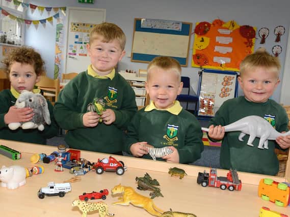Happy days for the new children at Holy Island and Lowick C. of E. First Schools. Picture by Jane Coltman