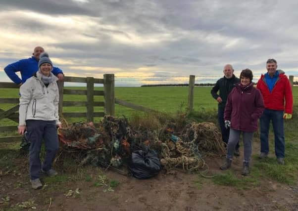 Some of the people who took part in the beach litter pick at Sugar Sands.